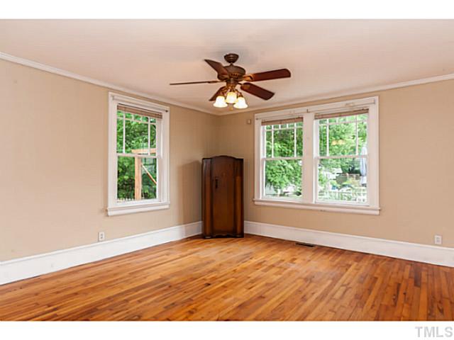 1519 Hanover Street Raleigh, NC 27608 - Photo 11 of 18 a view of an empty room with a window