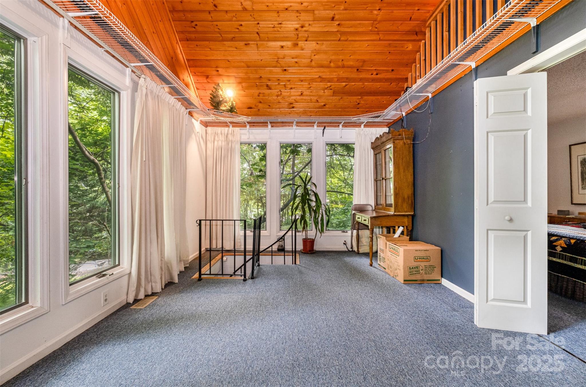 1102 Lake Montonia Road Kings Mountain, NC 28086 - Photo 22 of 48 a view of a room with furniture and floor to ceiling window