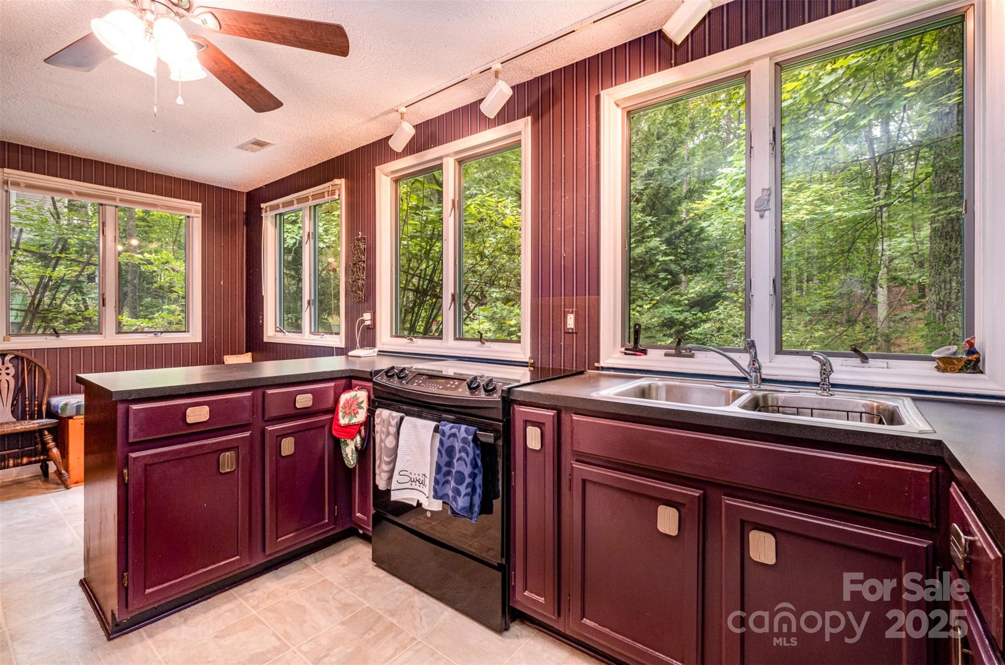 1102 Lake Montonia Road Kings Mountain, NC 28086 - Photo 26 of 48 a kitchen that has a sink and a large window