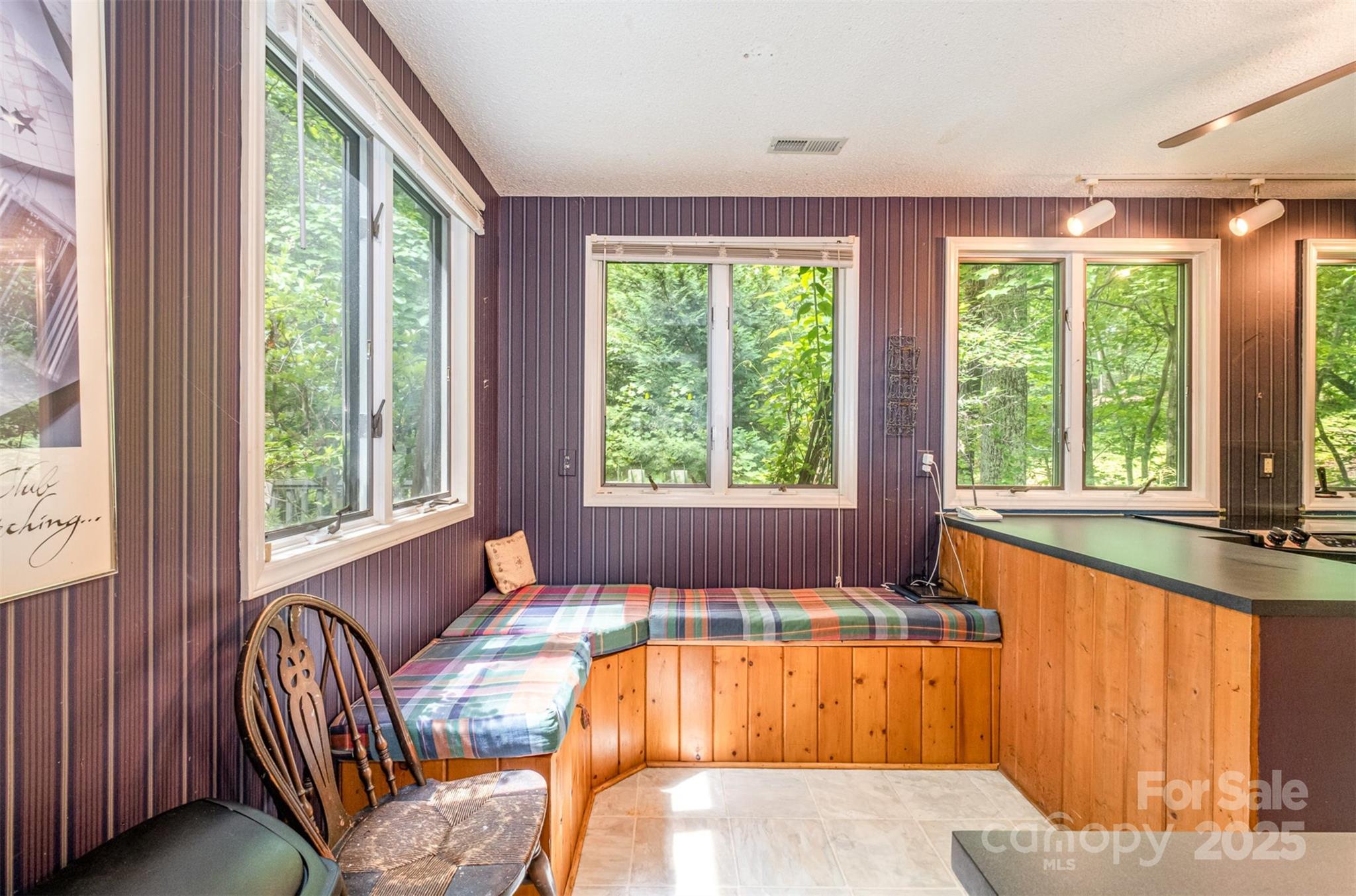 1102 Lake Montonia Road Kings Mountain, NC 28086 - Photo 30 of 48 a living room with large windows and furniture