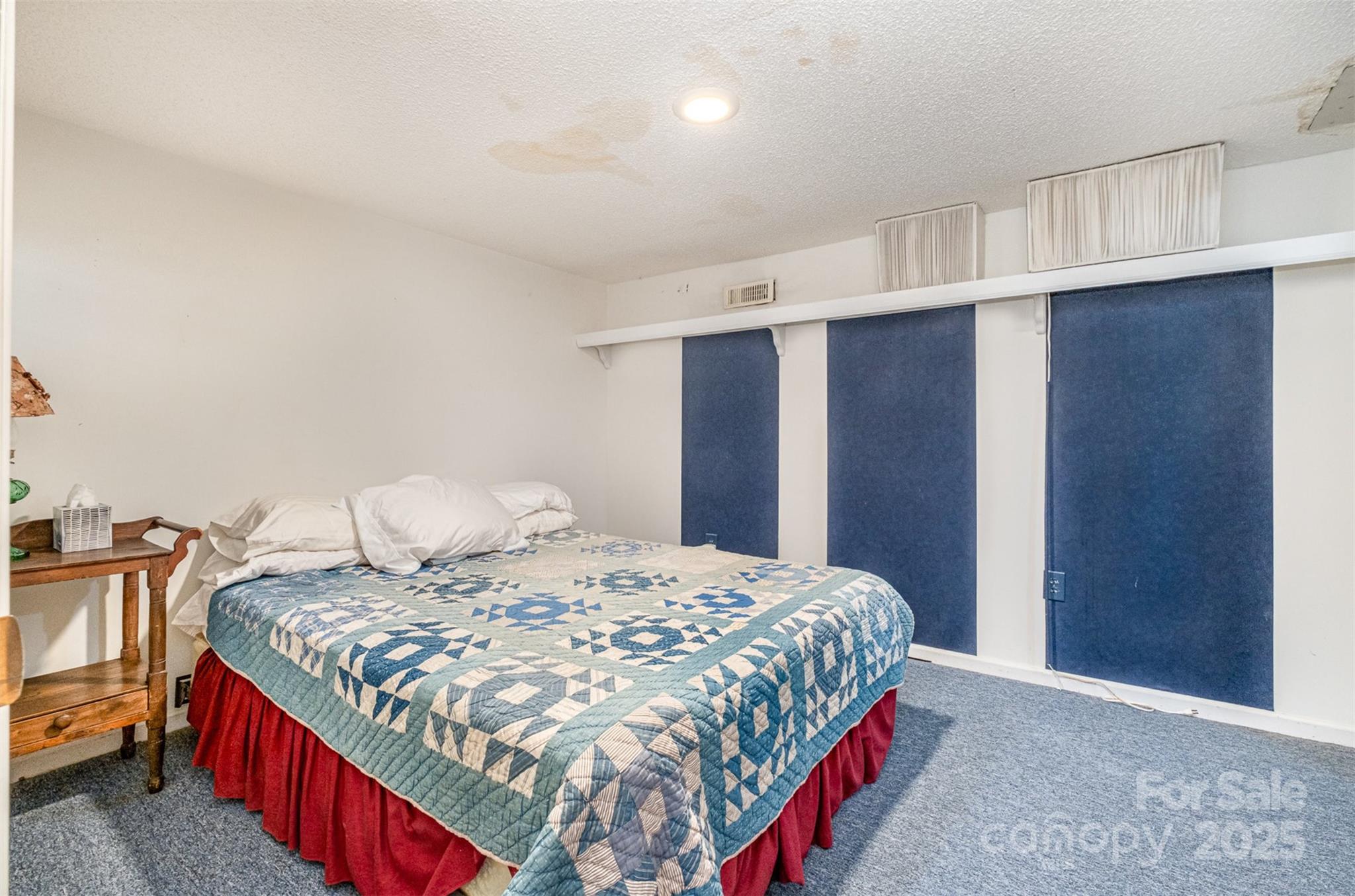 1102 Lake Montonia Road Kings Mountain, NC 28086 - Photo 35 of 48 a bedroom with a bed and a closet