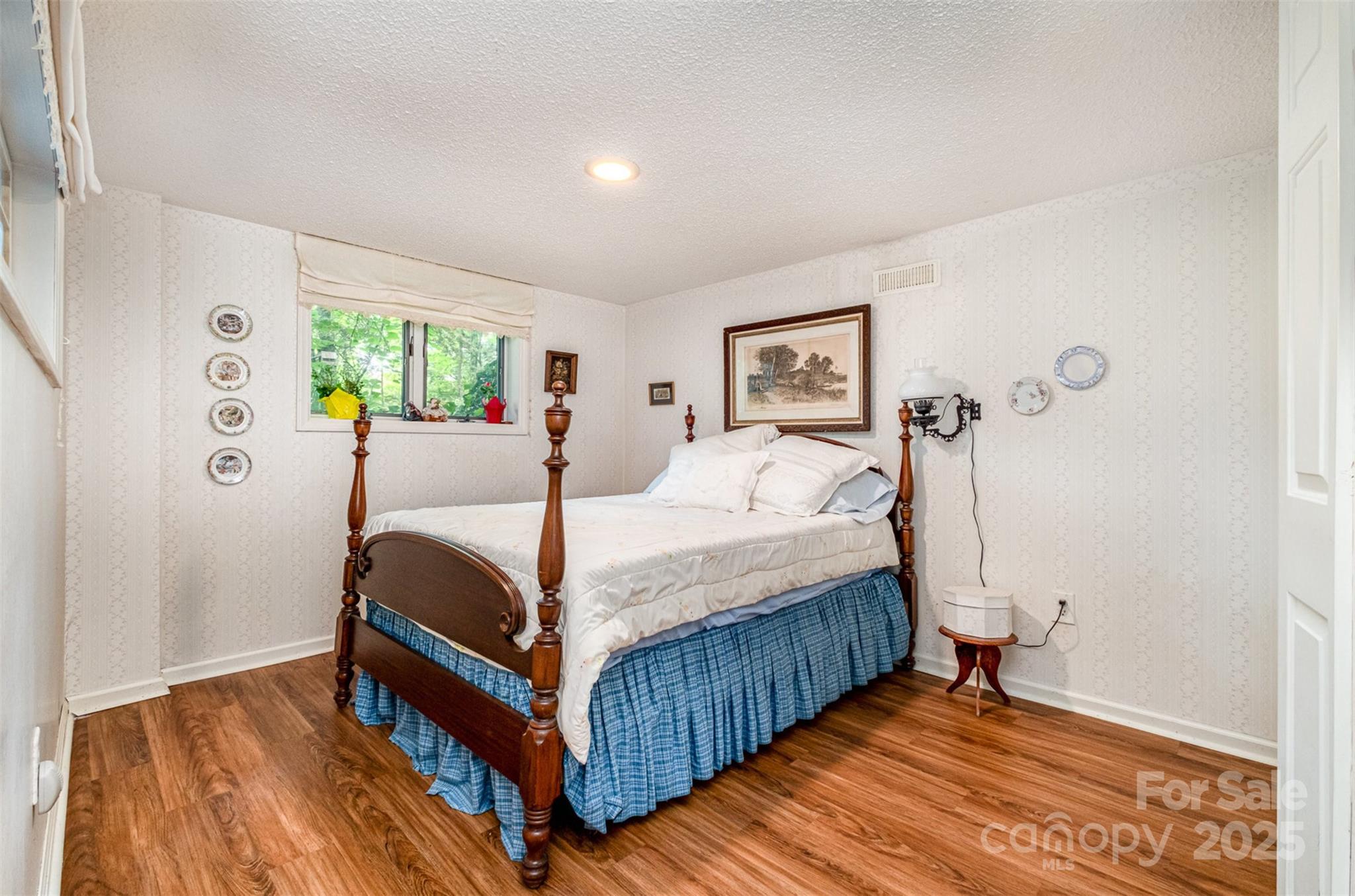1102 Lake Montonia Road Kings Mountain, NC 28086 - Photo 36 of 48 a bedroom with a bed and a window