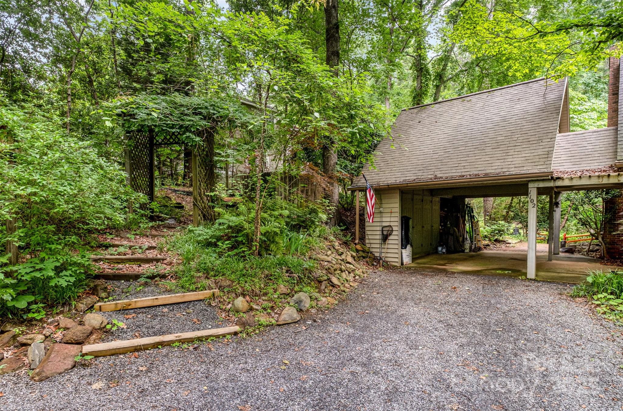 1102 Lake Montonia Road Kings Mountain, NC 28086 - Photo 40 of 48 a view of a house with a yard
