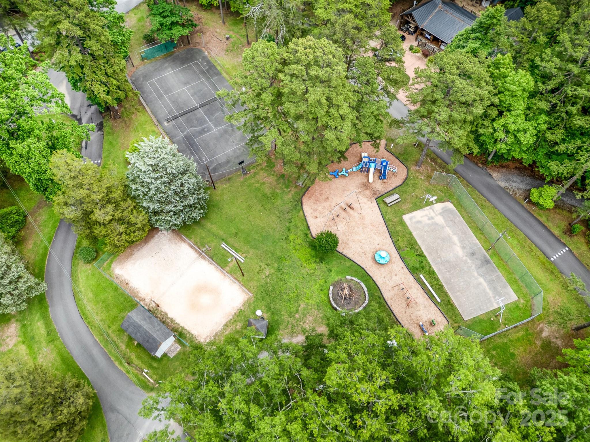 1102 Lake Montonia Road Kings Mountain, NC 28086 - Photo 46 of 48 an aerial view of a house with a swimming pool