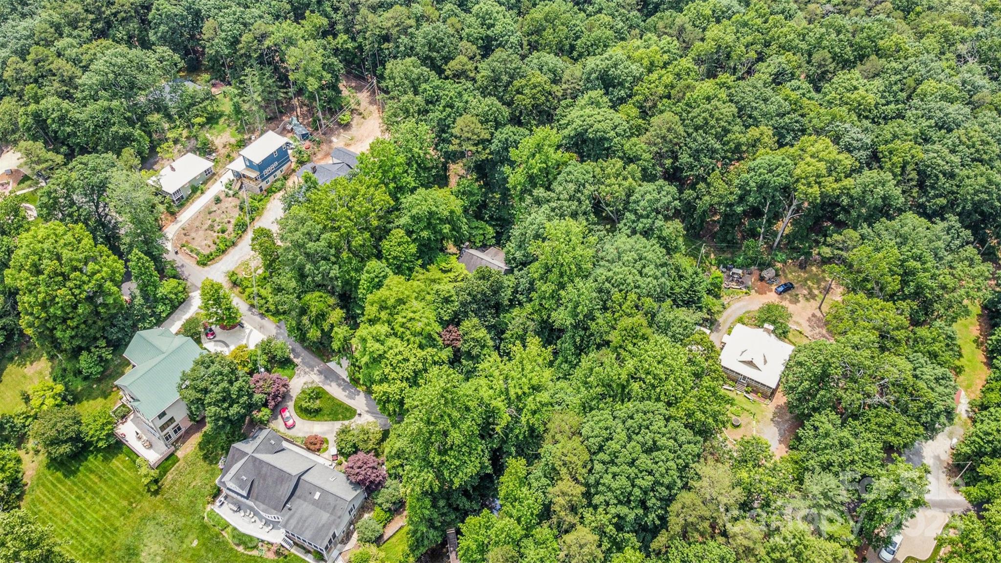 1102 Lake Montonia Road Kings Mountain, NC 28086 - Photo 48 of 48 an aerial view of a residential houses with yard and parking space