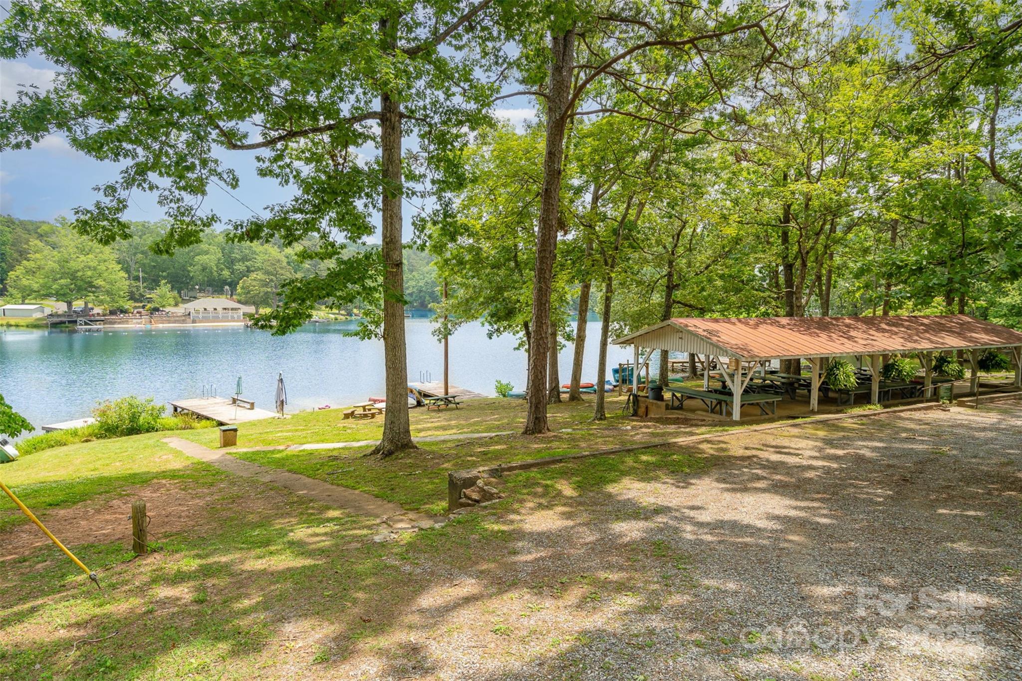 1102 Lake Montonia Road Kings Mountain, NC 28086 - Photo 7 of 48 a view of a swimming pool with a patio and a yard