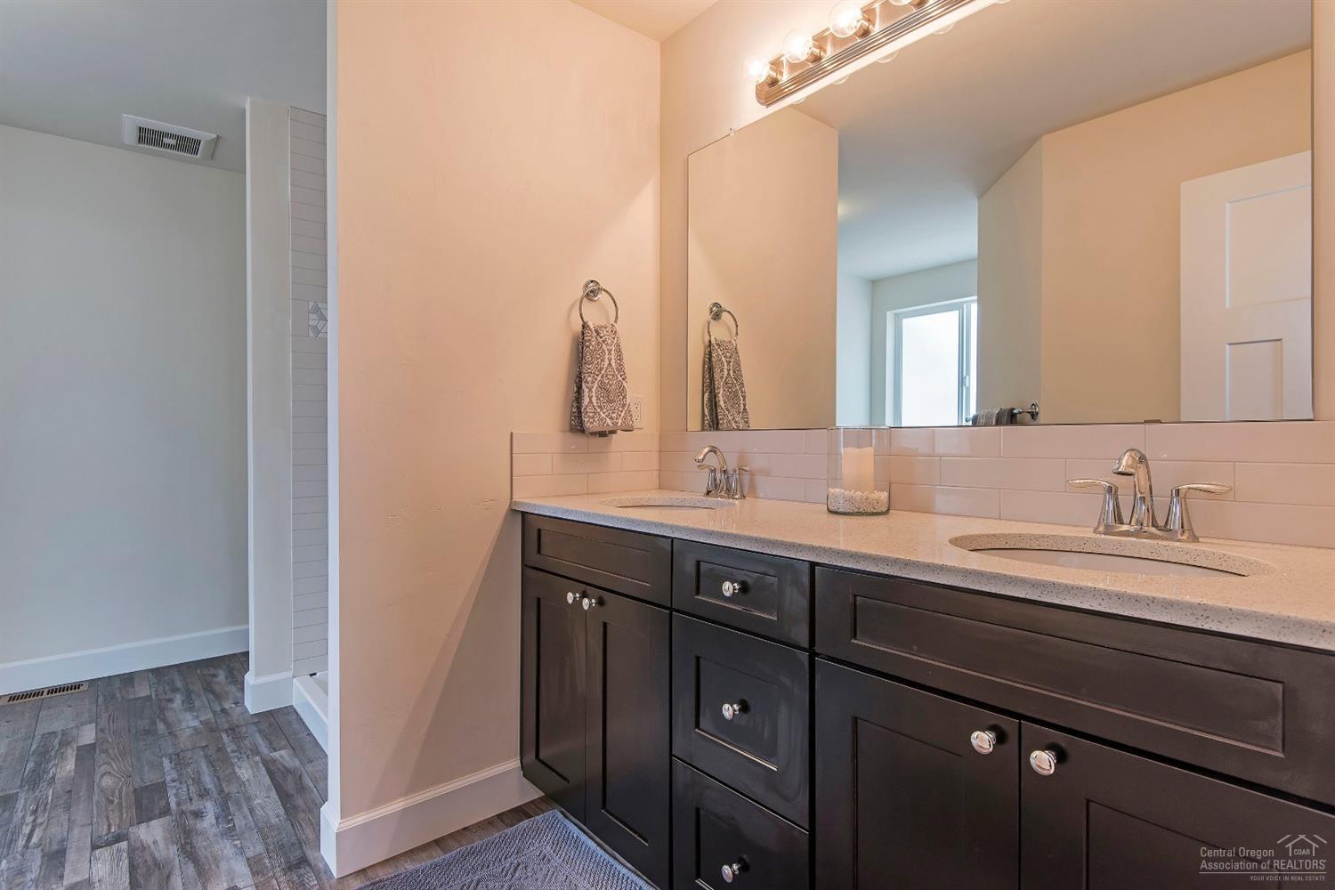 61165 Ward Road Bend, OR 97702 - Photo 15 of 25 a bathroom with a sink and a mirror