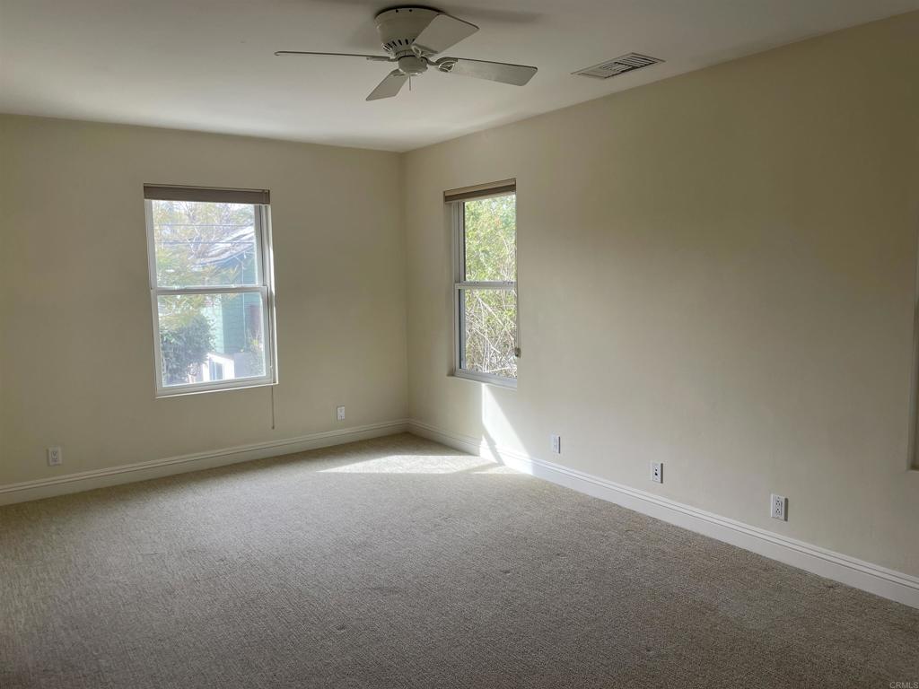 428 La Veta Avenue Encinitas, CA 92024 - Photo 18 of 25 a view of an empty room with a window