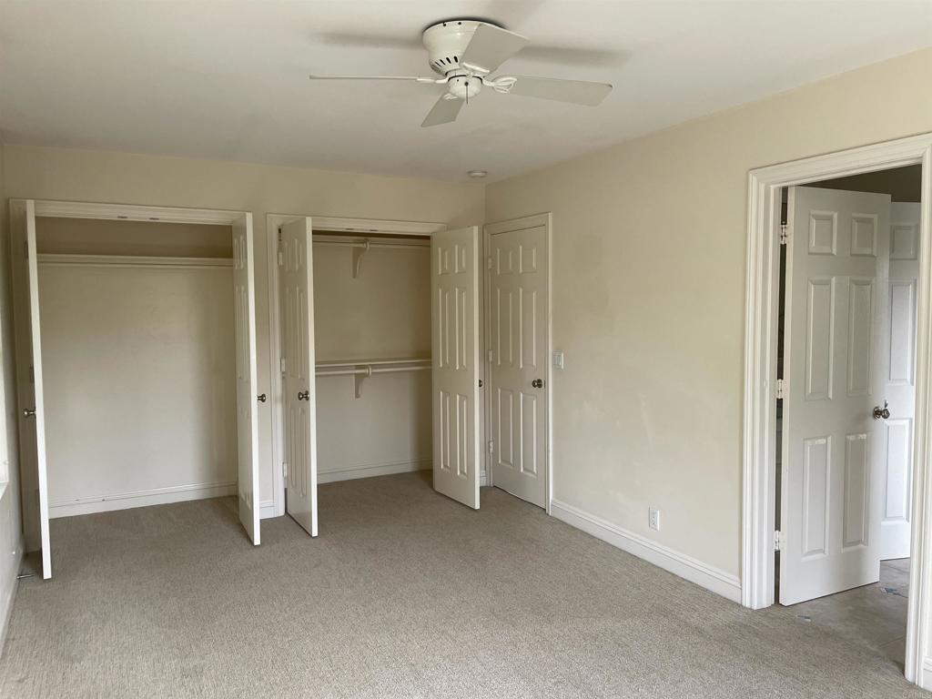 428 La Veta Avenue Encinitas, CA 92024 - Photo 19 of 25 a view of an empty room with a ceiling fan