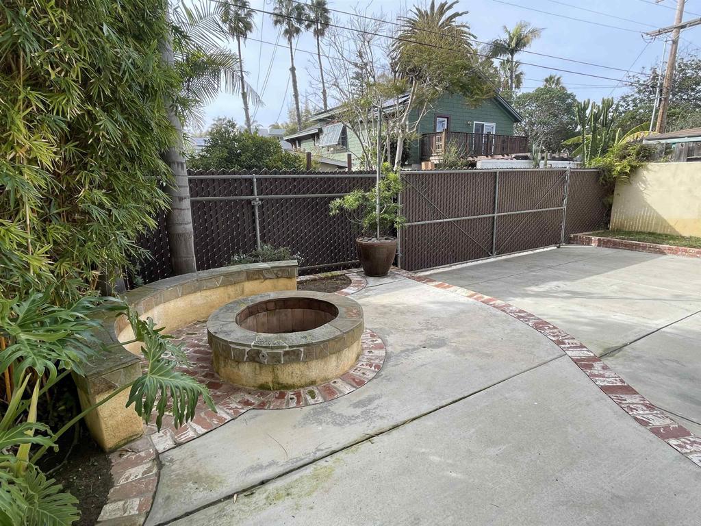428 La Veta Avenue Encinitas, CA 92024 - Photo 24 of 25 a view of a chair and table in the backyard