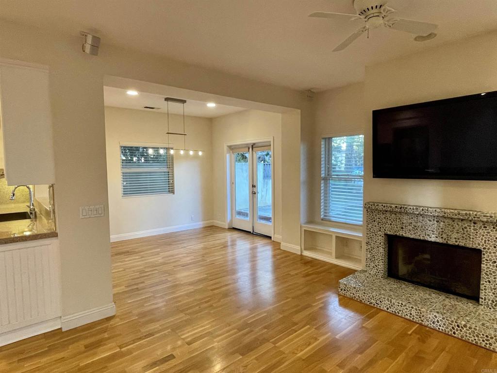 428 La Veta Avenue Encinitas, CA 92024 - Photo 7 of 25 a view of an empty room with a fireplace and a window