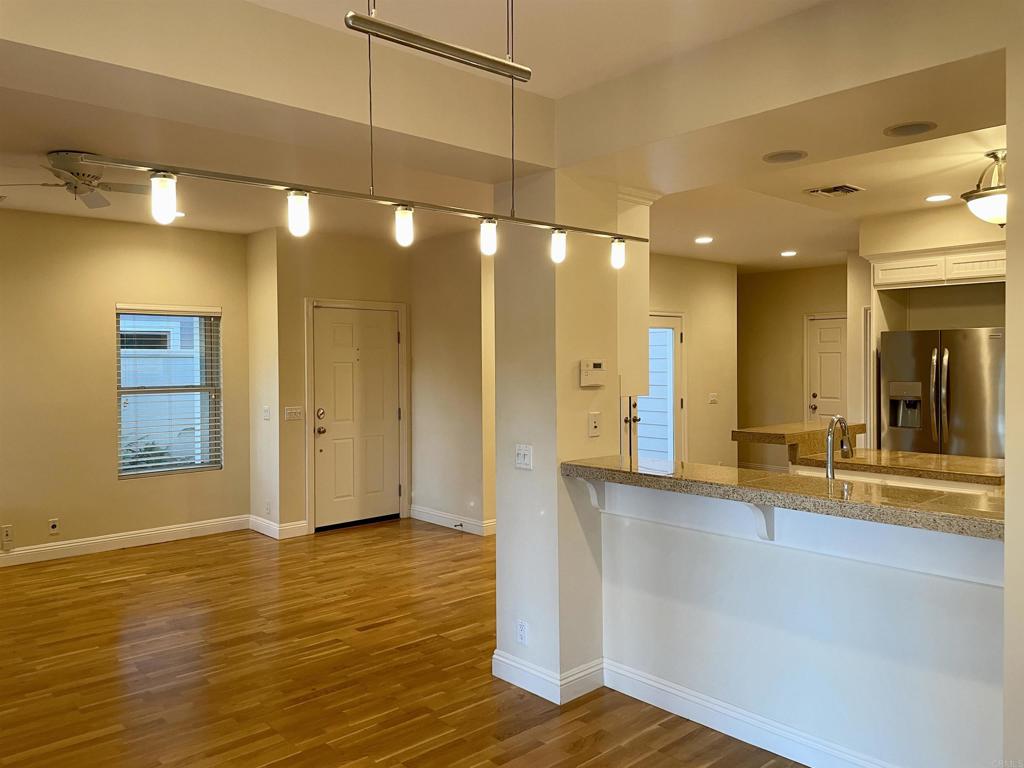 428 La Veta Avenue Encinitas, CA 92024 - Photo 8 of 25 a view of a room with wooden floor
