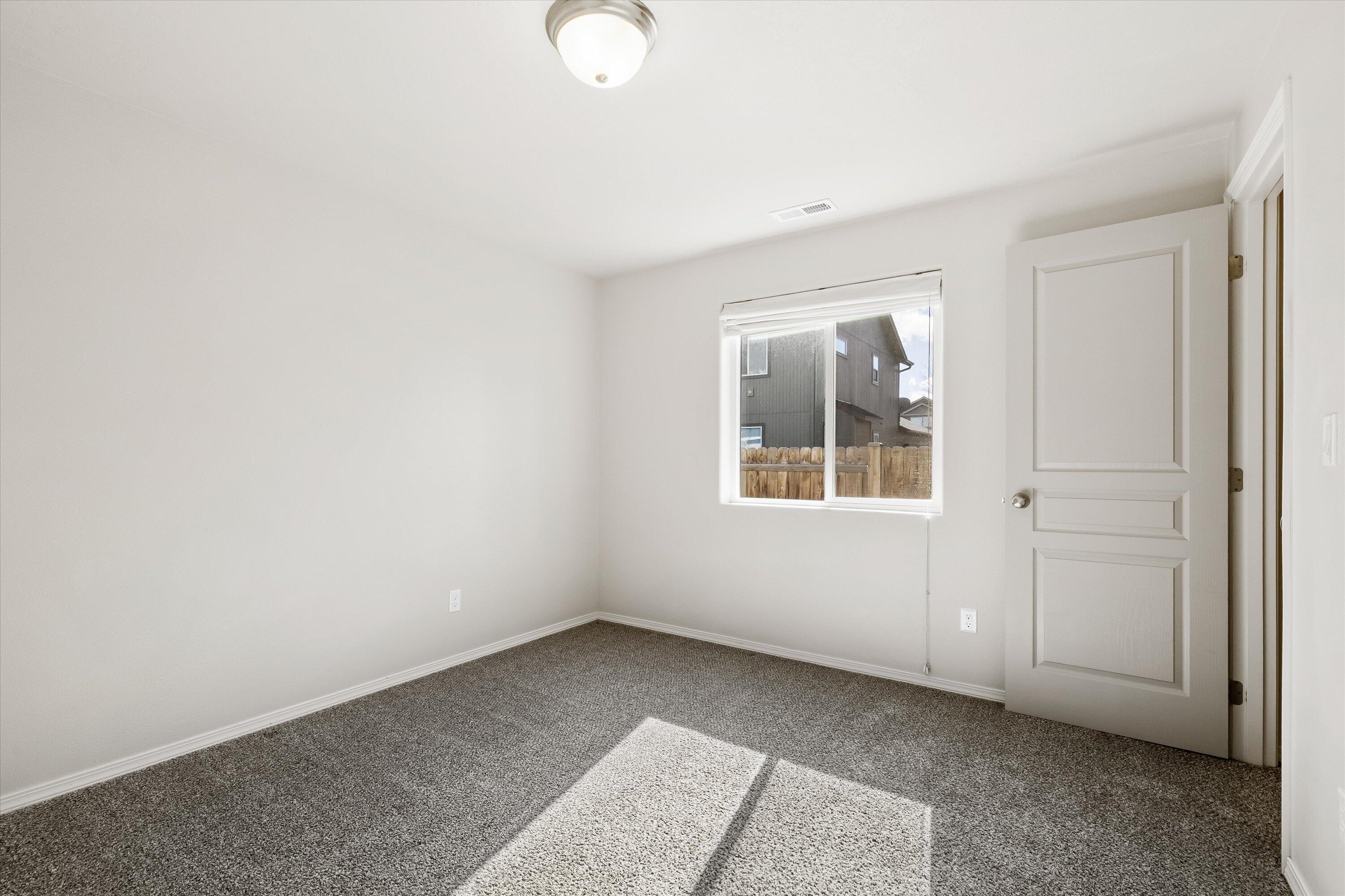 61803 Southeast Rolo Court Bend, OR 97702 - Photo 18 of 23 Guest Bedroom