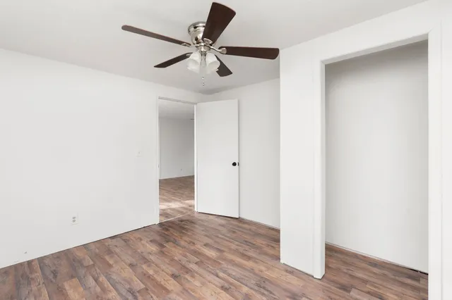 a view of a livingroom with wooden floor