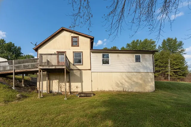 a view of a yard with swimming pool