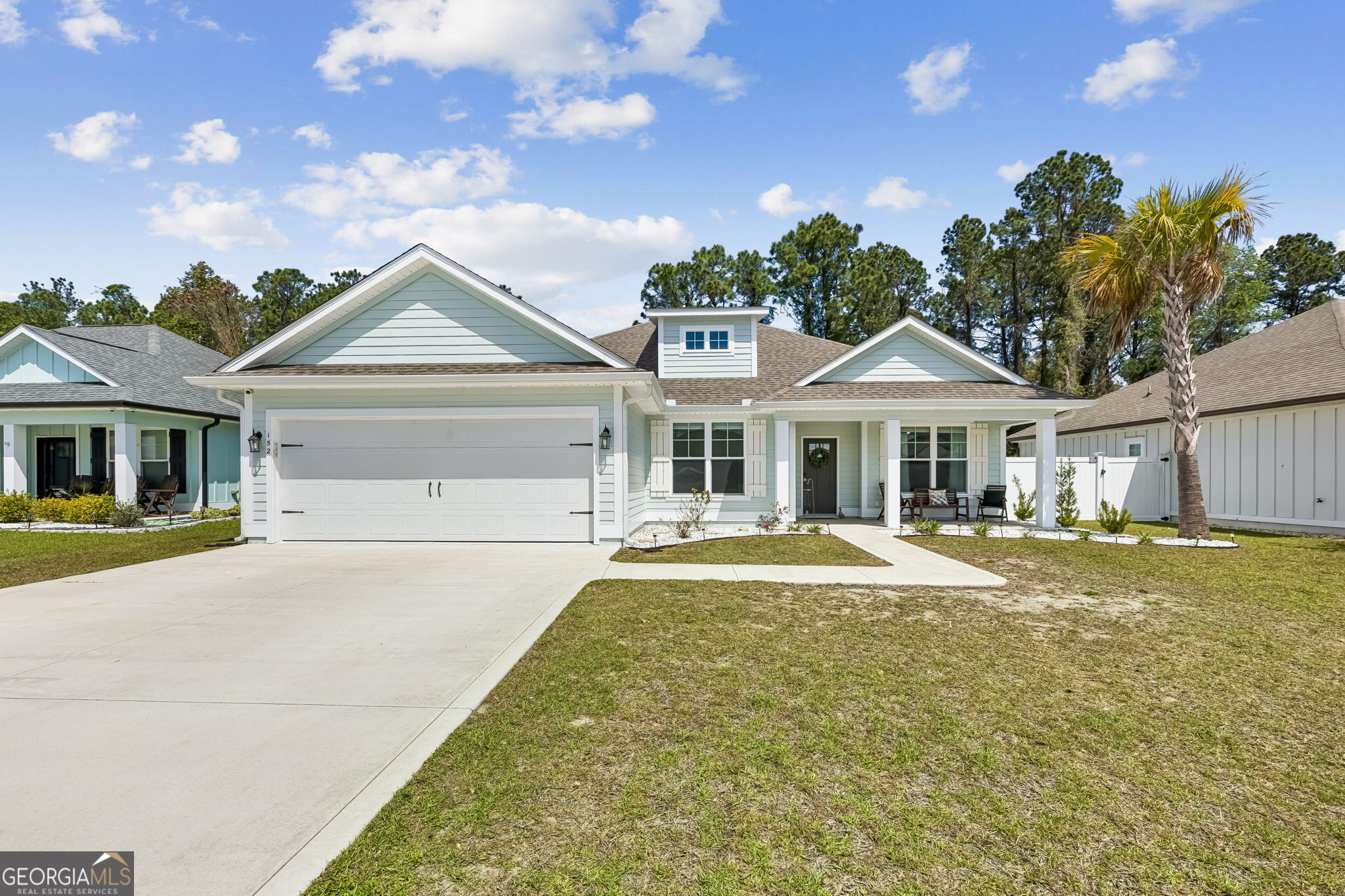 152 Verano Street Kingsland, GA 31548 - Photo 1 of 55 a front view of a house with garden