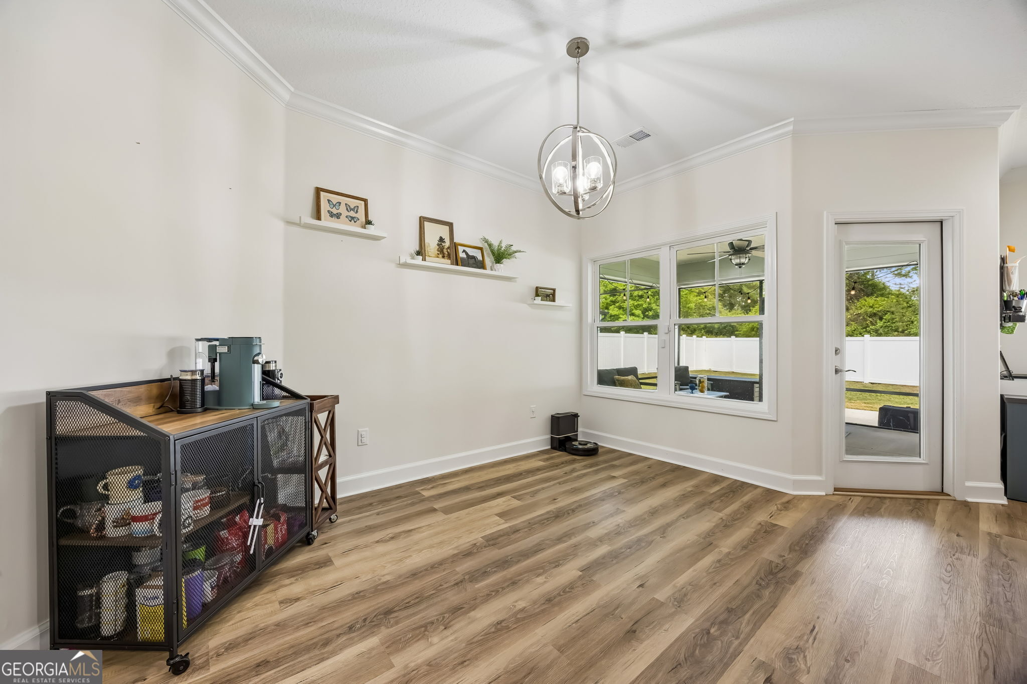 152 Verano Street Kingsland, GA 31548 - Photo 11 of 55 a view of livingroom with furniture and hardwood floor