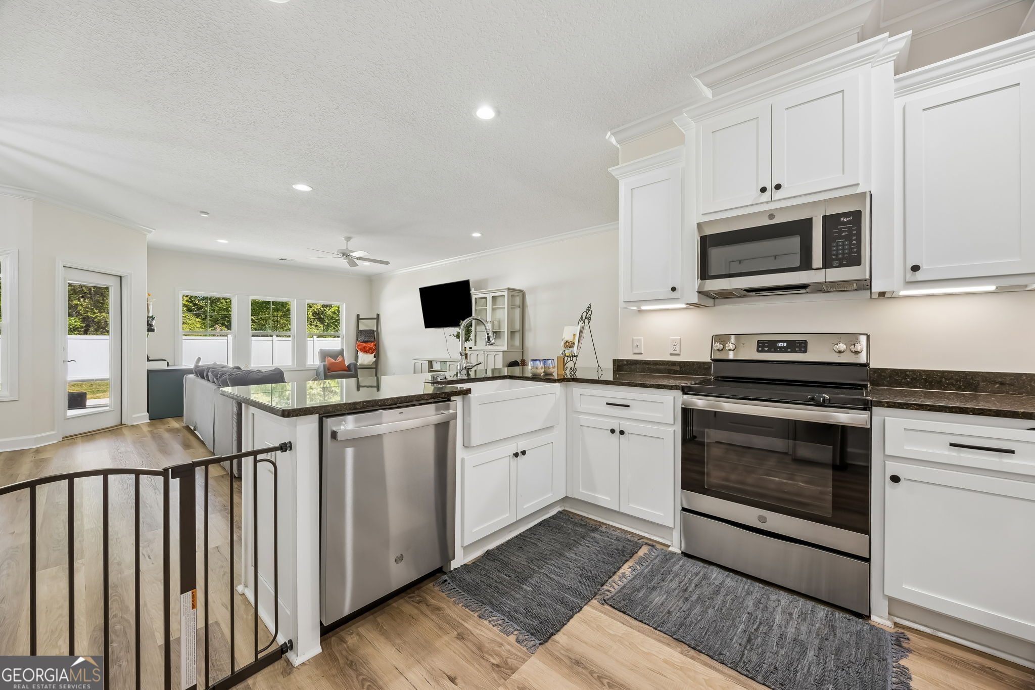 152 Verano Street Kingsland, GA 31548 - Photo 15 of 55 a kitchen with granite countertop a sink and steel appliances