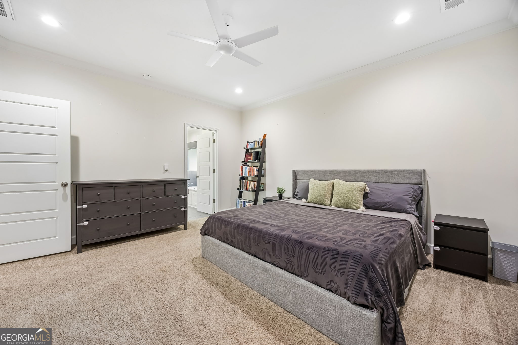 152 Verano Street Kingsland, GA 31548 - Photo 18 of 55 a bedroom with a bed and a dresser