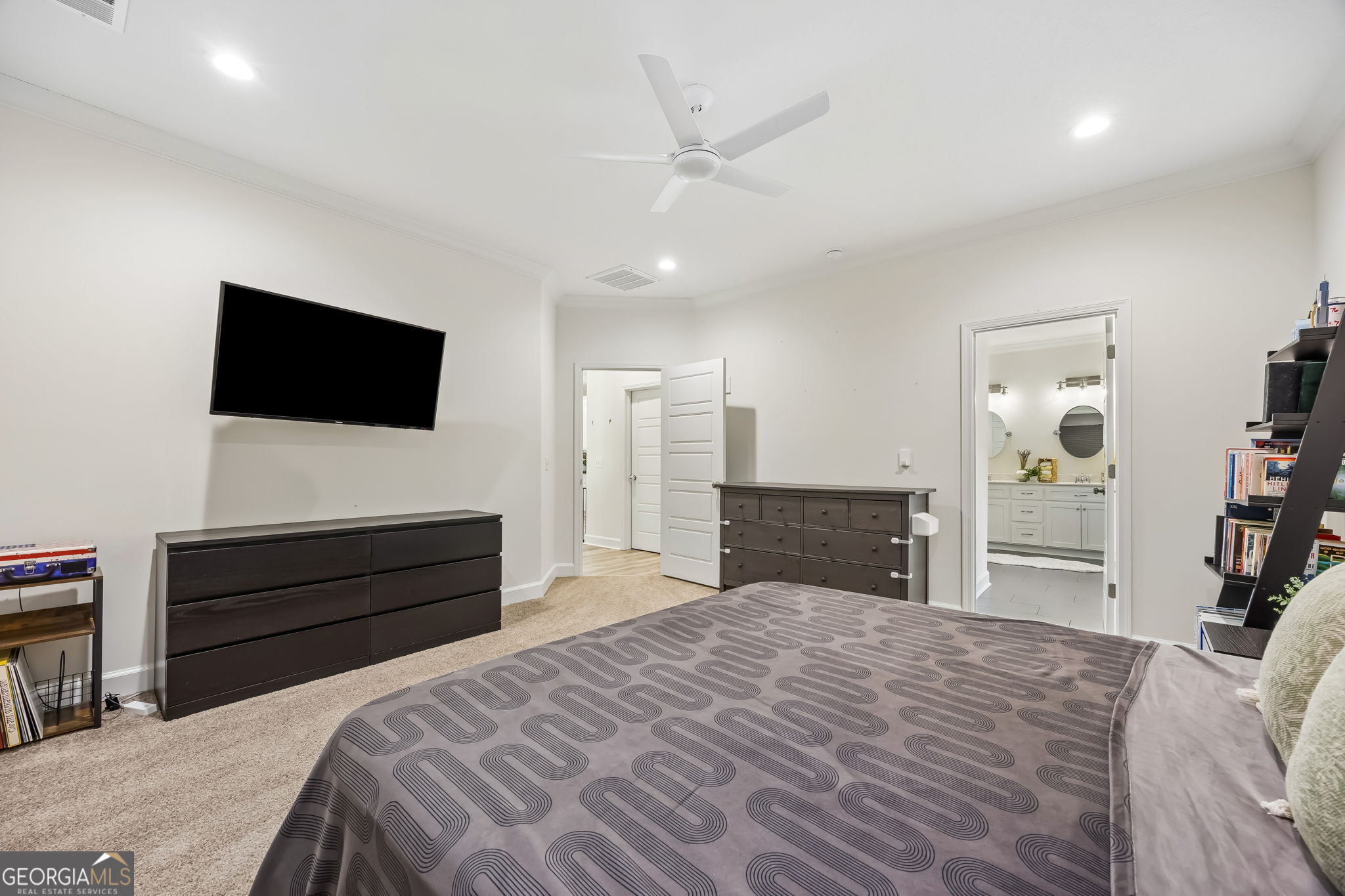 152 Verano Street Kingsland, GA 31548 - Photo 19 of 55 a bedroom with a bed and a flat screen tv