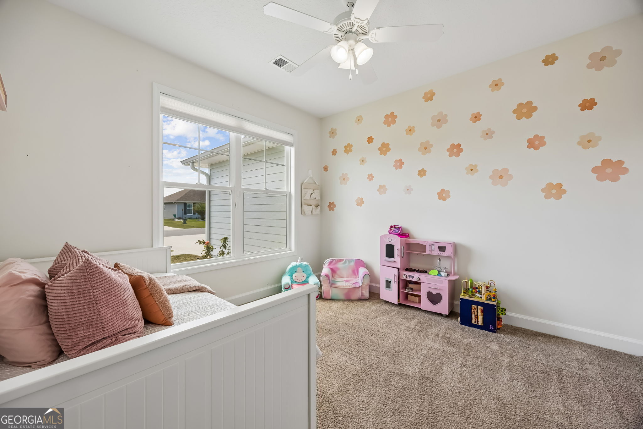 152 Verano Street Kingsland, GA 31548 - Photo 23 of 55 a living room with furniture and a window