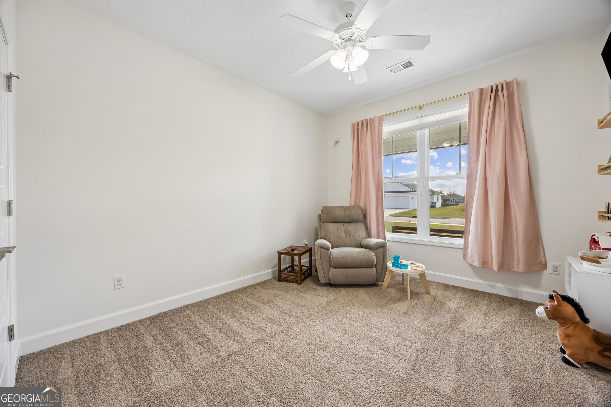 152 Verano Street Kingsland, GA 31548 - Photo 25 of 55 a room with furniture and a window