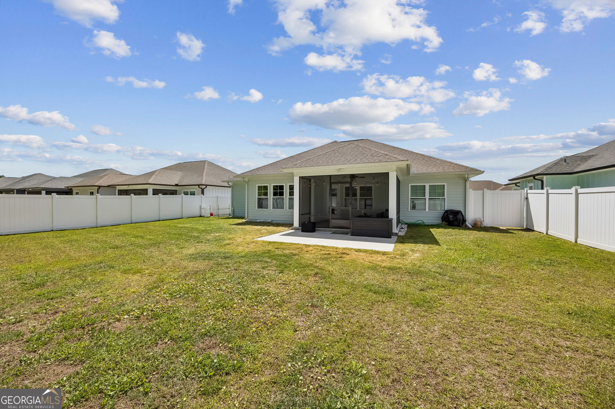 152 Verano Street Kingsland, GA 31548 - Photo 36 of 55 a view of a house with a backyard