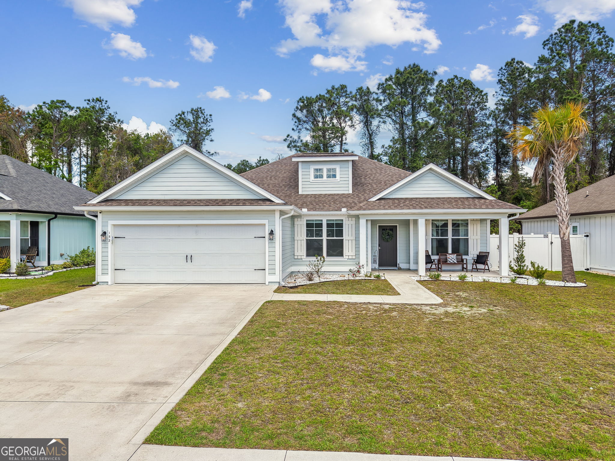 152 Verano Street Kingsland, GA 31548 - Photo 38 of 55 a front view of a house with garden