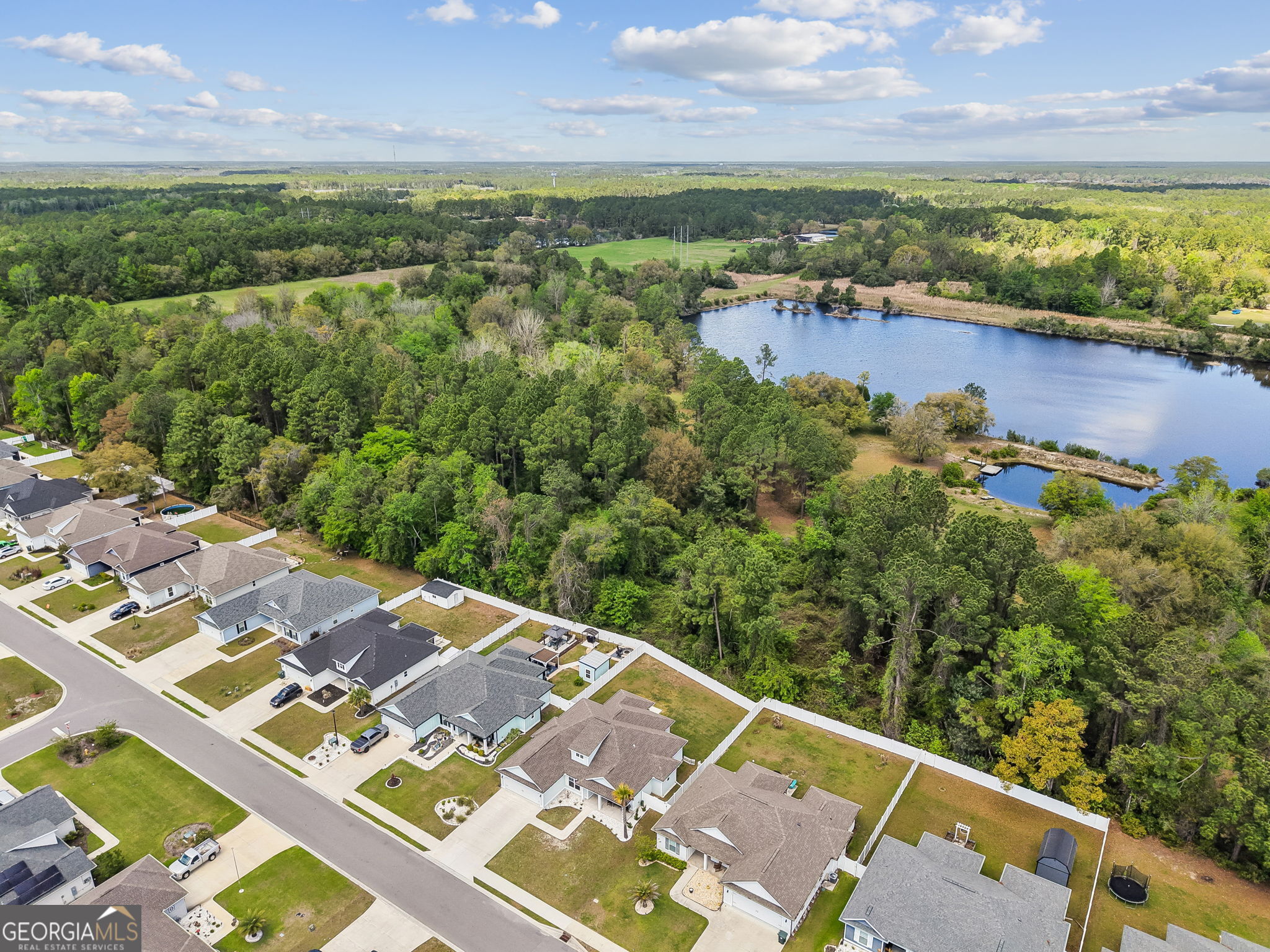 152 Verano Street Kingsland, GA 31548 - Photo 42 of 55 an aerial view of residential building with outdoor space and lake view