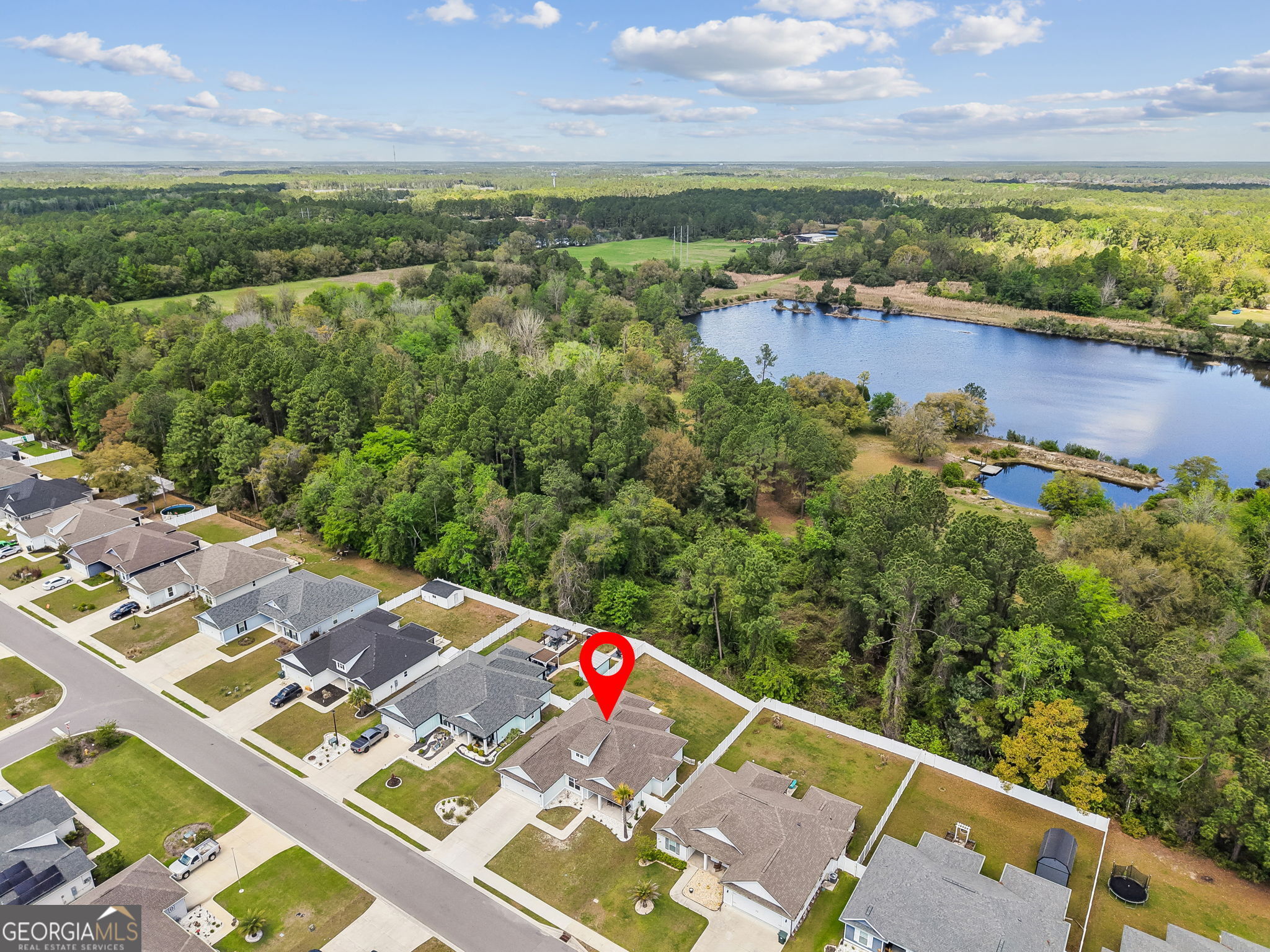 152 Verano Street Kingsland, GA 31548 - Photo 43 of 55 an aerial view of lake and residential houses with outdoor space