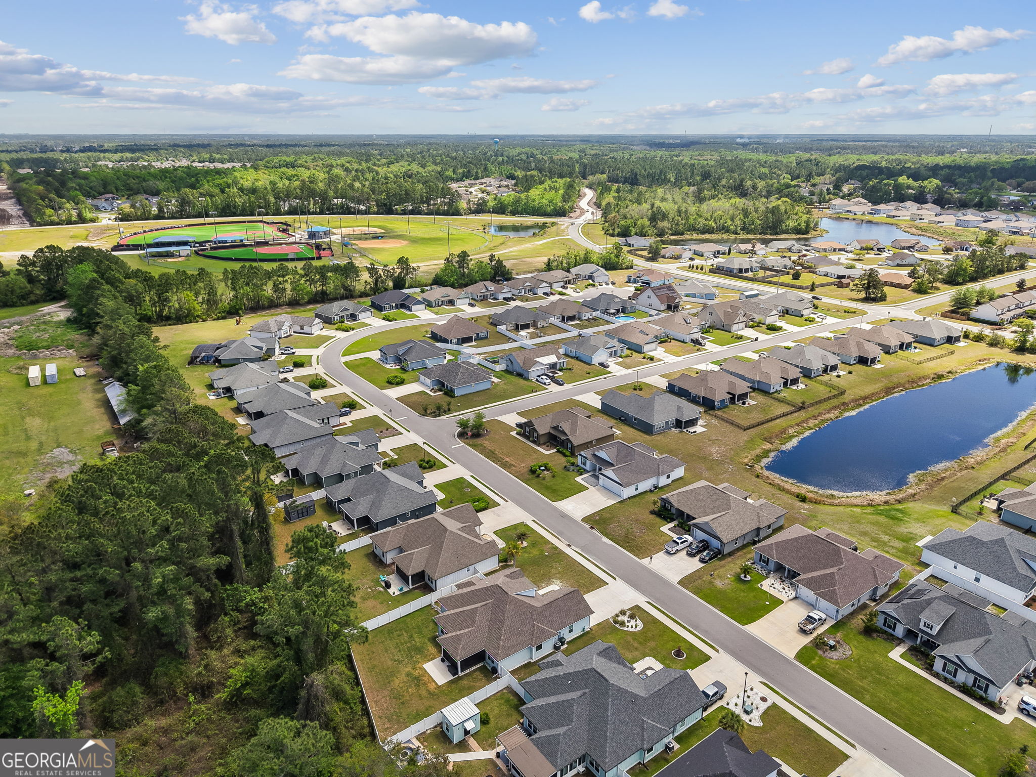 152 Verano Street Kingsland, GA 31548 - Photo 52 of 55 an aerial view of residential houses with outdoor space