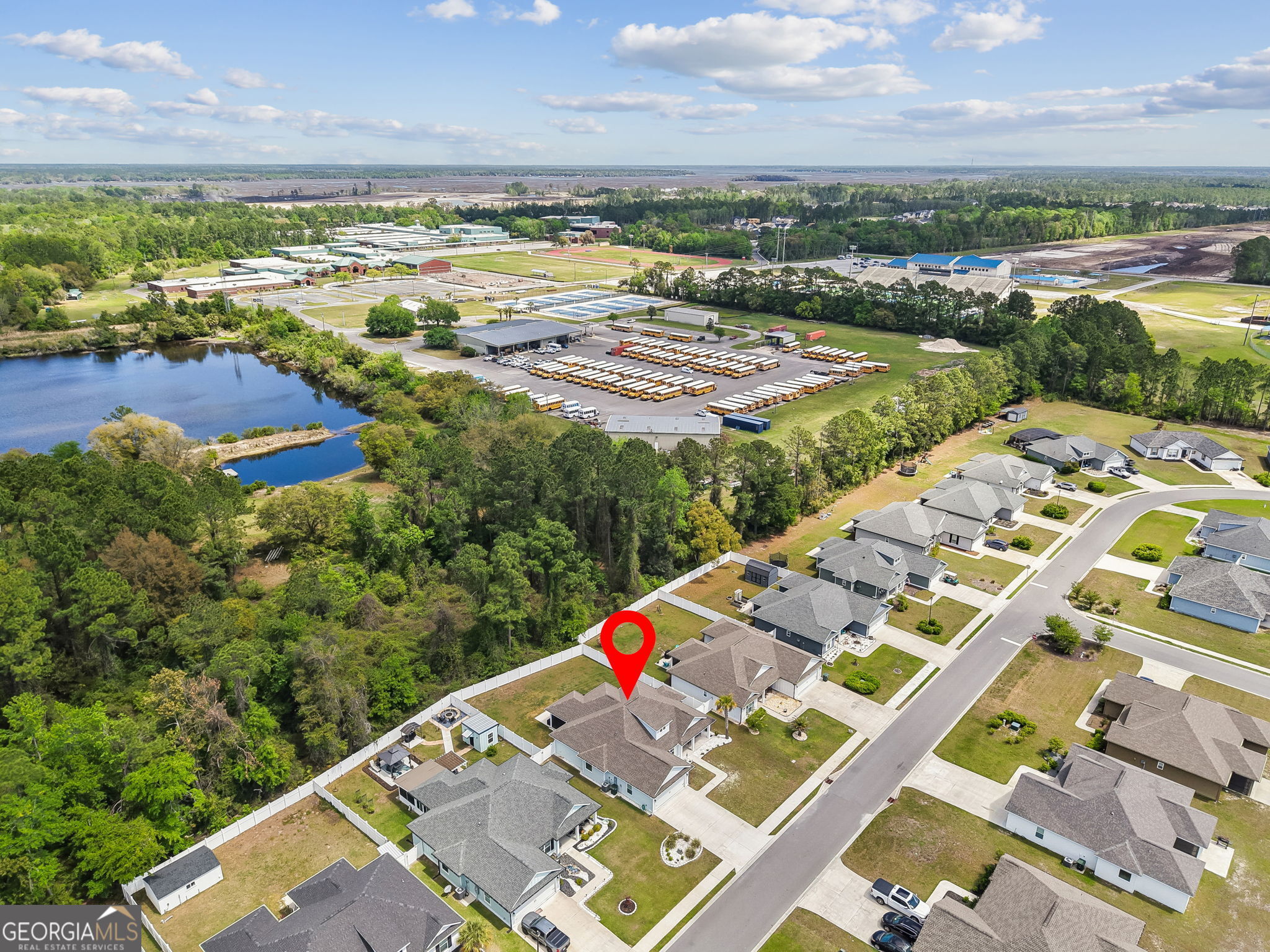 152 Verano Street Kingsland, GA 31548 - Photo 55 of 55 an aerial view of residential houses with outdoor space
