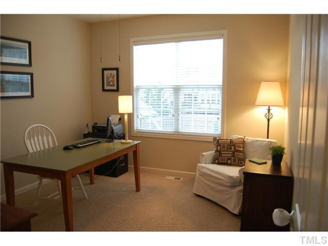8413 Dunnington Circle Raleigh, NC 27613 - Photo 9 of 21 a living room with furniture and a window