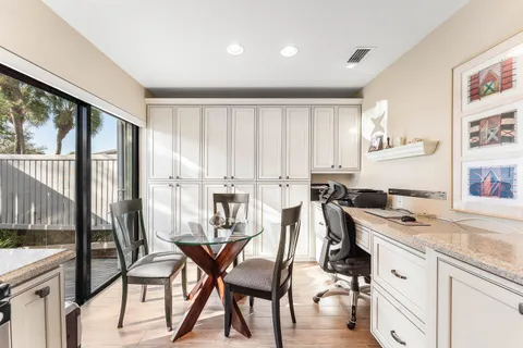 a kitchen with a stove a sink and a refrigerator