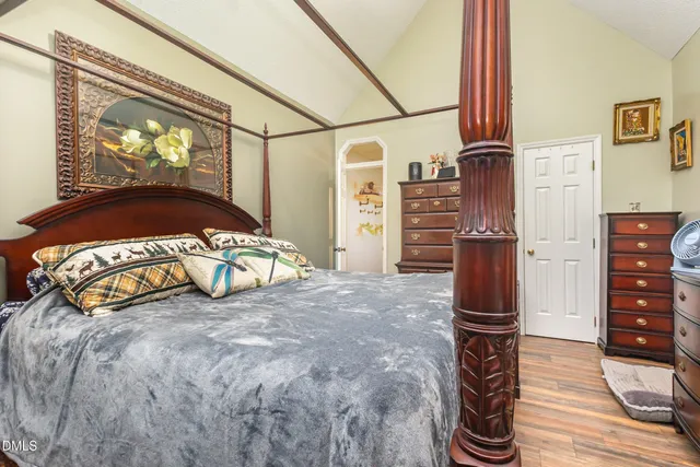 a view of a hallway with stairs