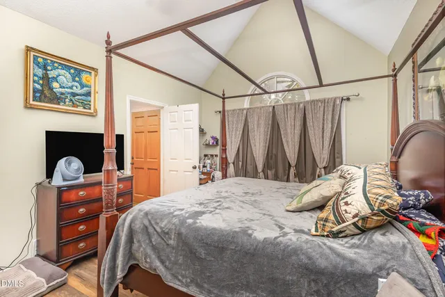 a view of a car park side of a house