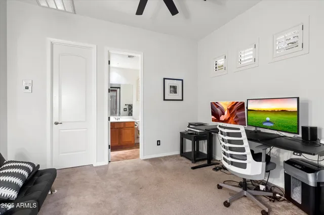 a view of a patio with couches and potted plants