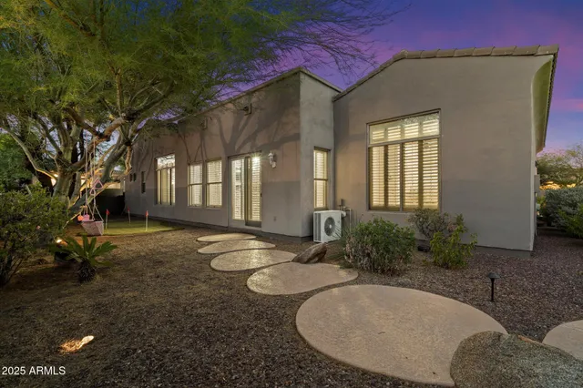 a view of a town with mountains in the background