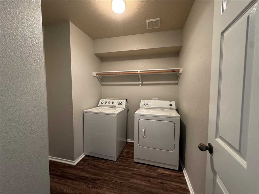 921 Whitewing Lane College Station, TX 77845 - Photo 12 of 14 a utility room with dryer and washer