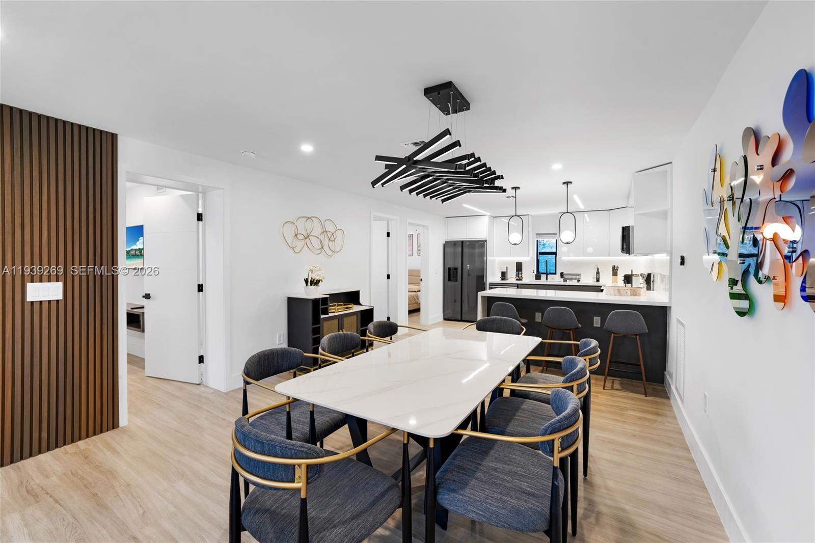 111 Northwest 53rd Street Miami, FL 33127 - Photo 17 of 53 a view of a dining room with furniture