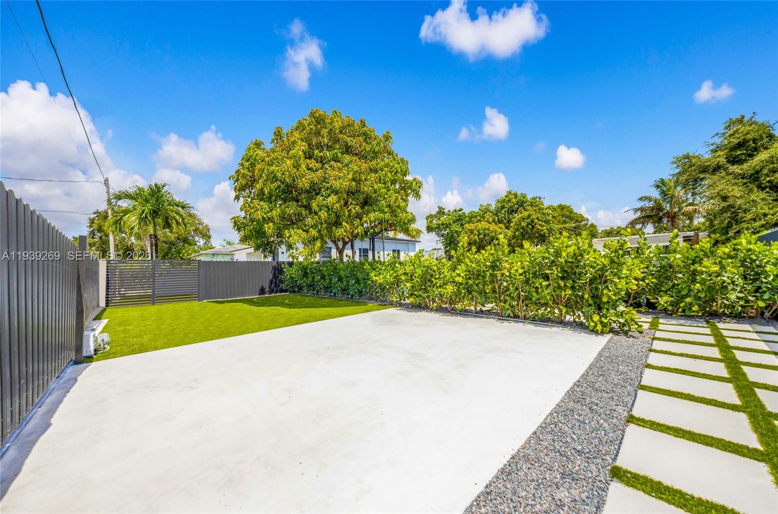 111 Northwest 53rd Street Miami, FL 33127 - Photo 43 of 53 a view of swimming pool with a yard