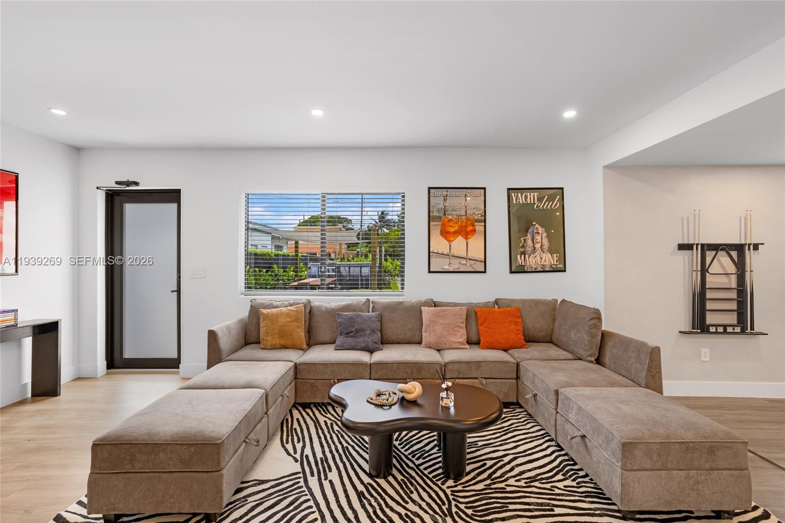 111 Northwest 53rd Street Miami, FL 33127 - Photo 5 of 53 a living room with furniture and a couch