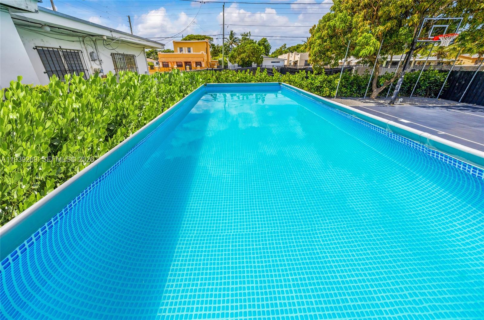 111 Northwest 53rd Street Miami, FL 33127 - Photo 51 of 53 a view of swimming pool from a balcony