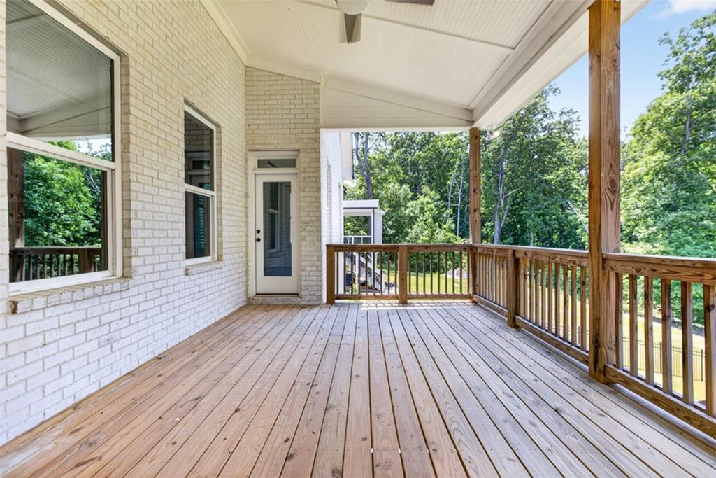 3528 North Bogan Road Buford, GA 30519 - Photo 72 of 79 a view of a room with wooden floor and balcony