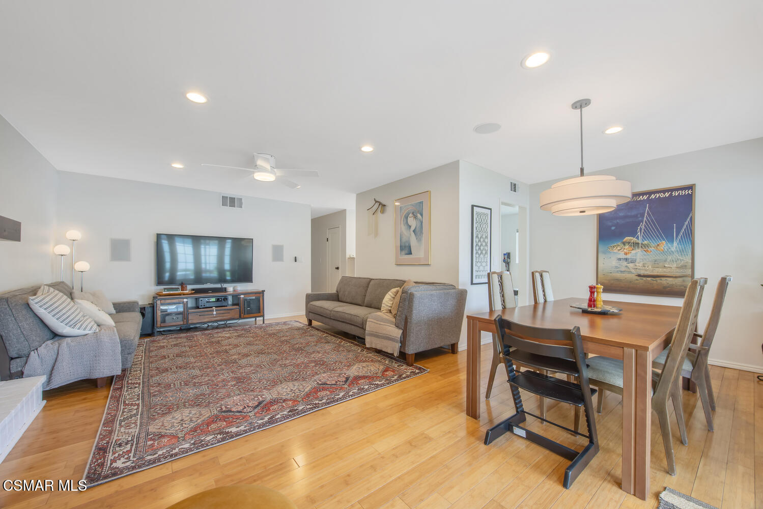 6657 Quartz Avenue Winnetka, CA 91306 - Photo 13 of 26 a living room with furniture and a chandelier