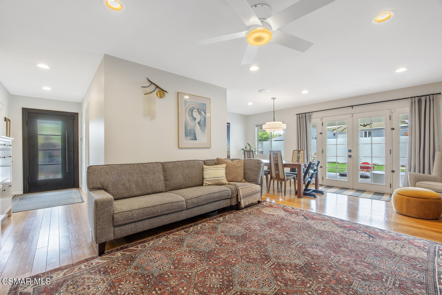 6657 Quartz Avenue Winnetka, CA 91306 - Photo 15 of 26 a living room with furniture and a table