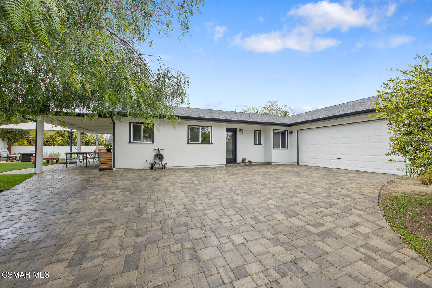 6657 Quartz Avenue Winnetka, CA 91306 - Photo 8 of 26 a view of a house with a patio