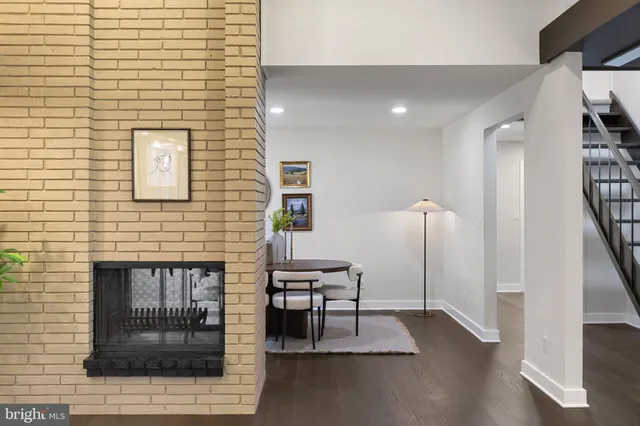 a view of a livingroom with furniture and window