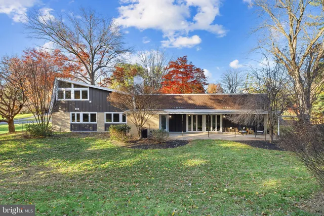 a picture of a bathroom with a shower