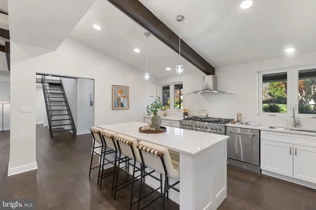 a living room with furniture fireplace and a fireplace